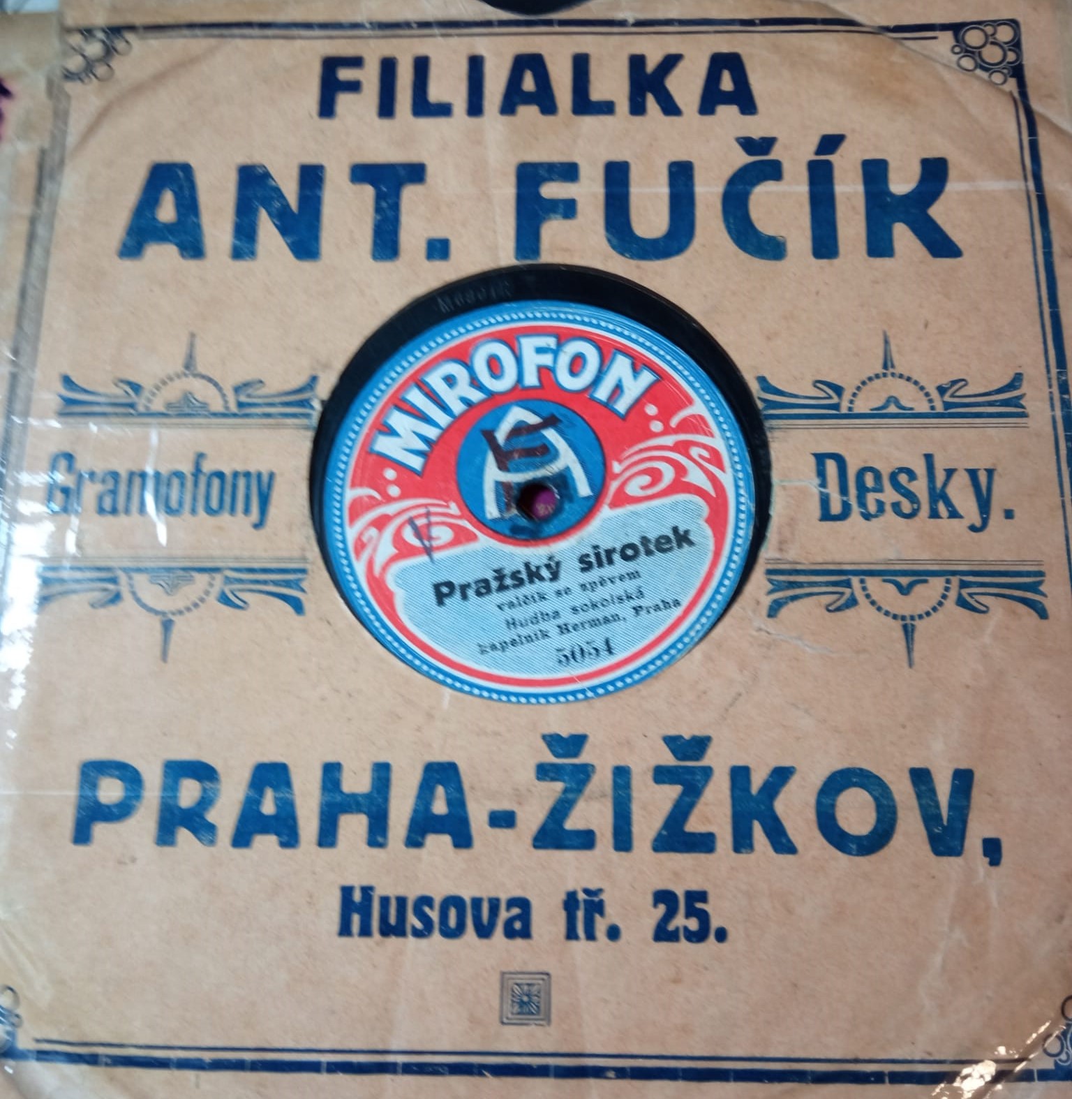 Obal s reklamou predajcu Anton Fučík