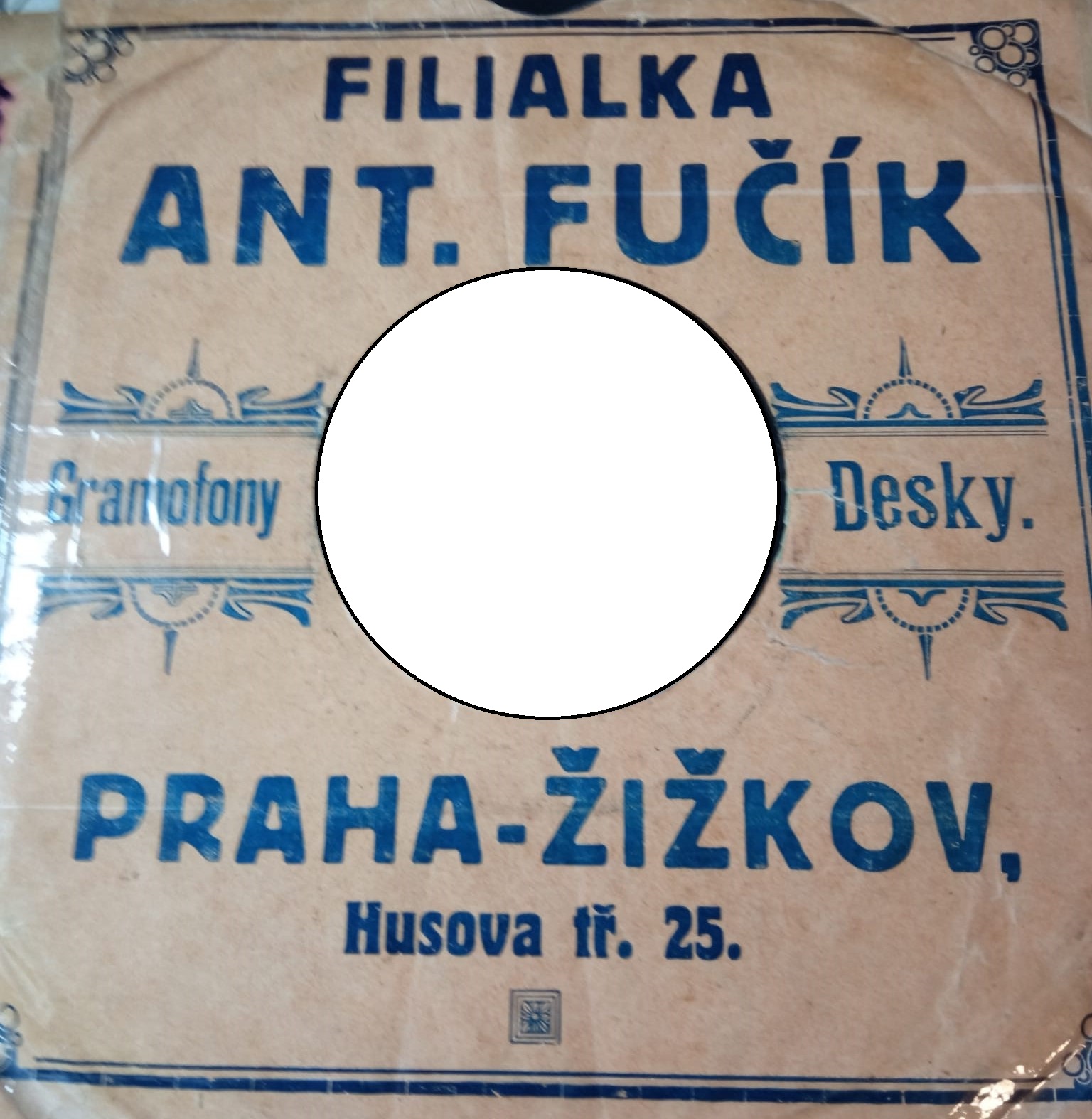 Obal s reklamou predajcu Anton Fučík