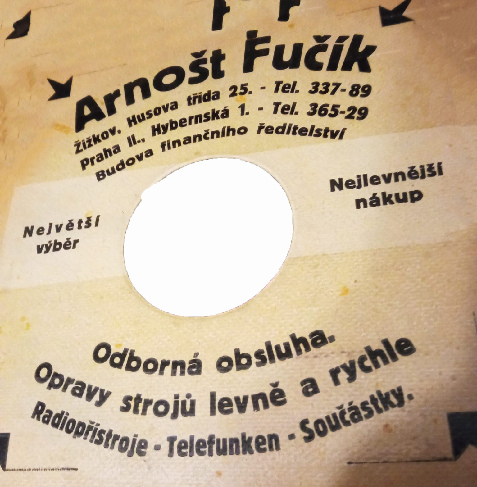 Obal s reklamou predajcu Arnošt Fučík